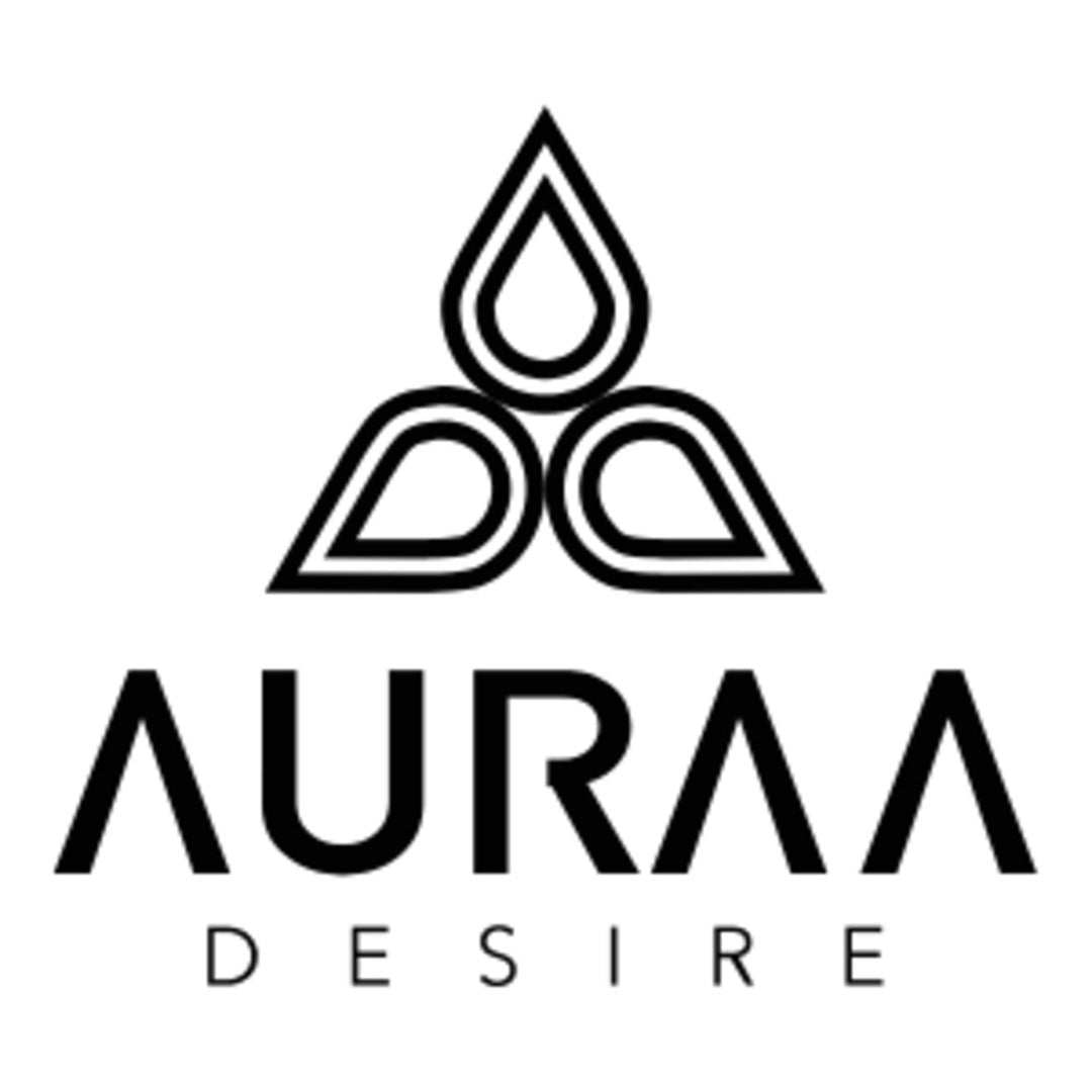 Botella de perfume Auraa Desire con diseño moderno y elegante, fragancia intensa y dulce.